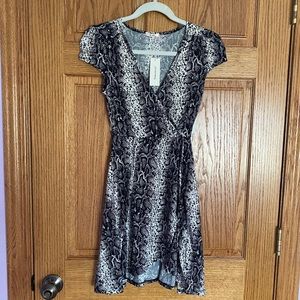 Francesca’s snake print faux wrap cap sleeve dress